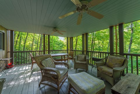 Covered deck with ample seating.