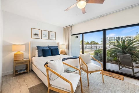 It's a cozy spot with a queen bed and sliding doors so you can step right out onto the patio and enjoy the day!
