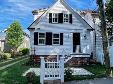 Front of apartment showing entry, parking on front shell area