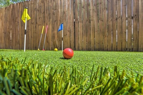 The back yard includes a putting green with equipment provided. Great for some friendly competition!