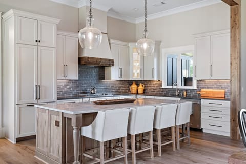 Gather at the island for meals, wine, conversation, and late-night snacks.