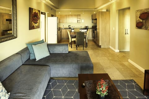 Comfort Apartment | Living area | 42-inch flat-screen TV with satellite channels