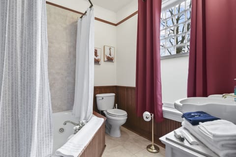 Bathroom with jetted bathtub