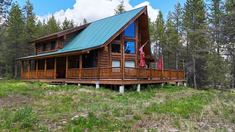 View of the front, main entrance, walkway and deck.