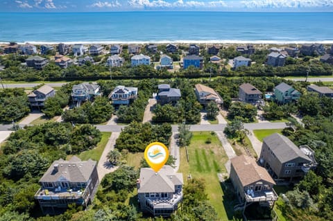Aerial View: Aerial view showcasing Mad Hatteras' soundside location and proximity to the beach.