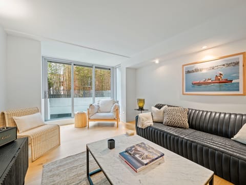 Apartment, Beach Access | Living area | 65-inch Smart TV with digital channels, MP3 dock