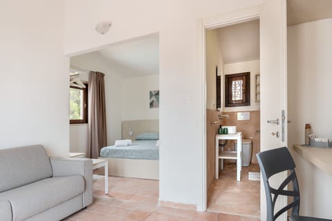 Premium bedding, desk, laptop workspace, blackout drapes