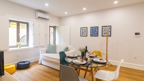 Take a break in our comfortable couch, with a flat screen TV for your entertainment #relax #modern