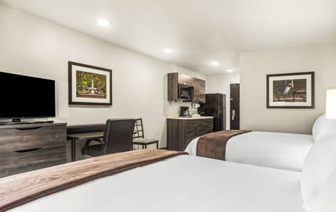 Pillowtop beds, desk, laptop workspace, blackout drapes