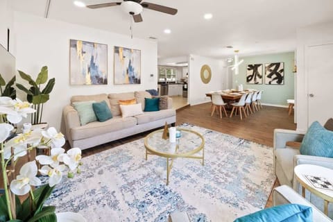 Relax in the cozy, stylish living room with modern décor, board games, and streaming TV—perfect for family bonding after a day at the beach. #FamilyFriendlyStay #FloridaVacationHome #LargoRental #RelaxAndUnwind #VacationVibes