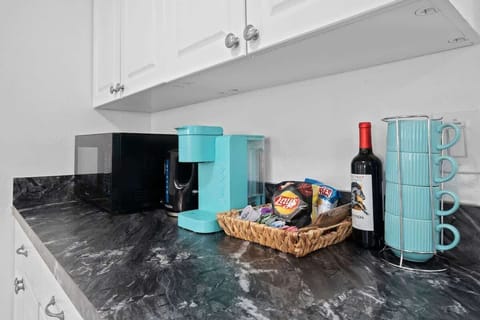 Enjoy Keurig coffee, snacks, and a bottle of wine on us. Stress-free mornings start here. #VacationReady #FamilyFriendlyStay #LargoFlorida