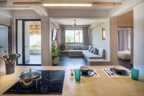 Kitchen and Living Room with TV - Sofa  RELAX WITH A DINE AND WINE , AND MAYBE A GOOD MOVIE CASA.LEAH