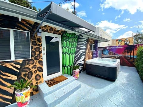 As you approach unit 1, tap into your wild side with our unique animal print mural showcasing the prints of a tiger, cheetah, alligator, zebra, giraffe and bird.