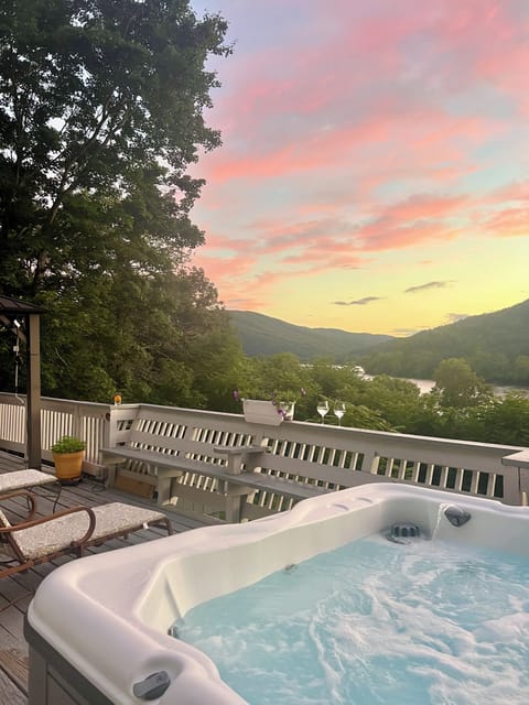 Enjoy breathtaking sunsets from the private hot tub
