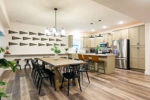 Dining room with tons of seating with fully equipped kitchen