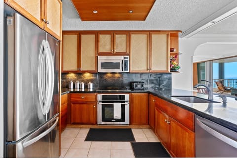 Fully stocked kitchen with granite countertops
