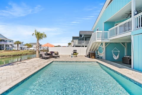 Above The Waves and into the pool for a week of fun at the beach.
