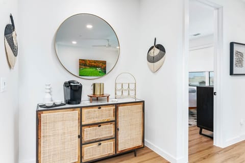 Beverage bar area complete with coffee maker