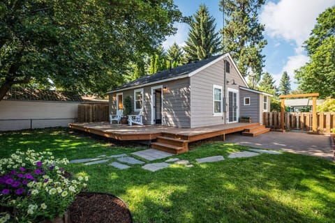 Fully Fenced backyard and patio with wrap around deck.
