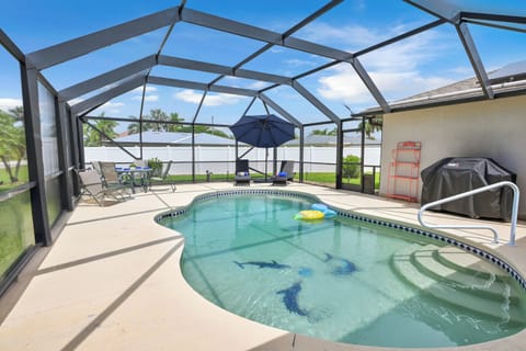 Solar and electric heated pool w/ outdoor seating/lounging