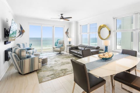 Relax in this stunning oceanfront living space where panoramic sea views fill your days with natural light and coastal charm.