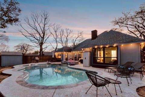 Private fully fenced backyard with a saltwater pool