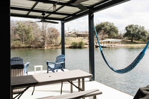 No lake house is complete without a hammock.  So nice to lie here in the shade of the covered deck and sway to the soft breeze coming off the lake.