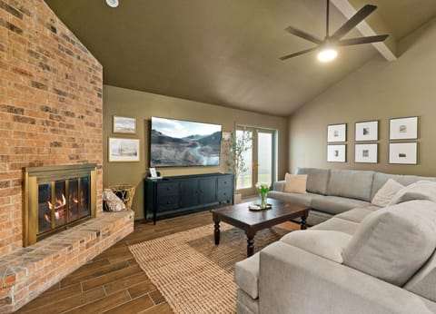 Living room with ample seating and open area to dining room