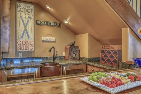 Wine fridge, beer/soda fridge and service ware. Pull up a seat and relax!