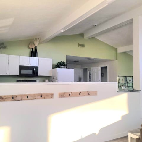 In February of 2025 we started to update the interior painting at this cabin so you may see a few pictures with Green and off White, those are the most current. 