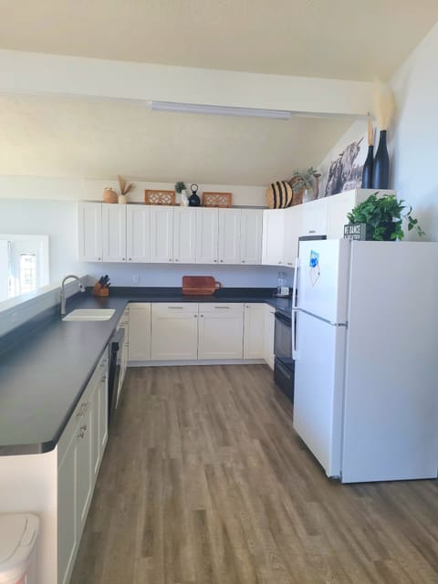 Kitchen is fully stocked with everything you should need to. Not interested in cooking, It is a quick walk to a local restaurant and you're located right next door to Okoboji Dough Store. 