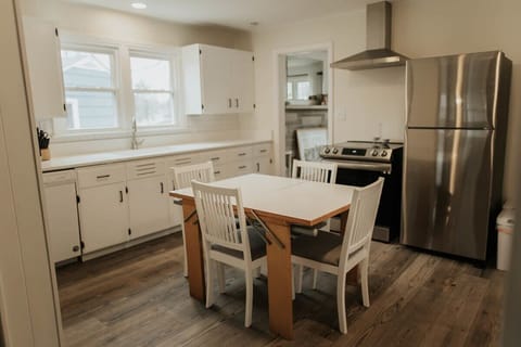 Elevate your dining experience with our charming four-seater dining table, perfect for intimate meals and lively conversations with loved ones.