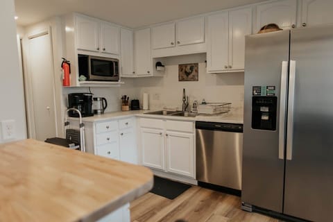 Indulge in the culinary delights of our finest kitchen, meticulously designed for both elegance and functionality. Immaculately clean and fully equipped with all your basic kitchen essentials, our space invites you to unleash your culinary creativity with ease and convenience. From whipping up quick snacks to crafting gourmet meals, every culinary endeavor is elevated in our sophisticated kitc...