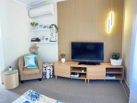 Comfortable Lounge for relaxing,Sofa and Big Screen Smart TV, Reverse Cycle A/C 