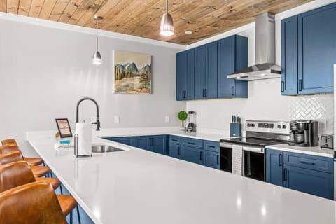 Stunning modern kitchen loaded with amenities.