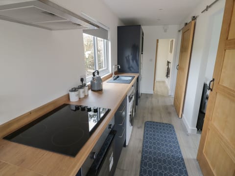 Fridge, electric kettle, toaster, cookware/dishes/utensils