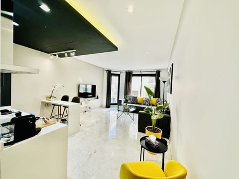 City Apartment | Living area | 55-inch Smart TV with cable channels, Netflix, streaming services