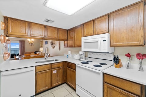 Condo, 2 Bedrooms, Beach View (715A) | Private kitchen | Full-size fridge, microwave, oven, stovetop