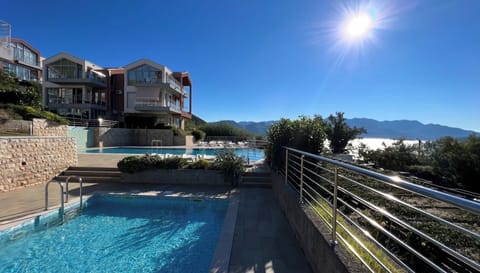The apartment is on the top above the pool area and facing the sea