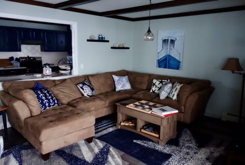 Rolling up on the spacious couch to watch a movie.