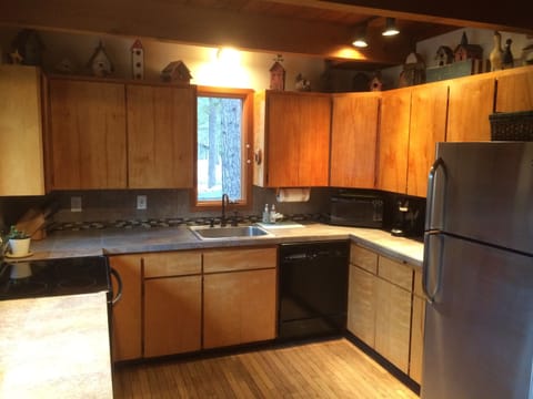 Complete kitchen including dishwasher, stove/oven, microwave, disposal
