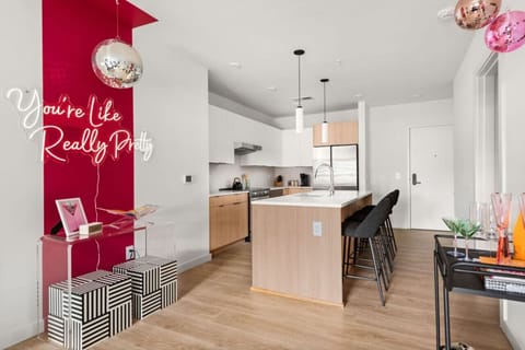 Kitchen, open space with wall decor and island seating