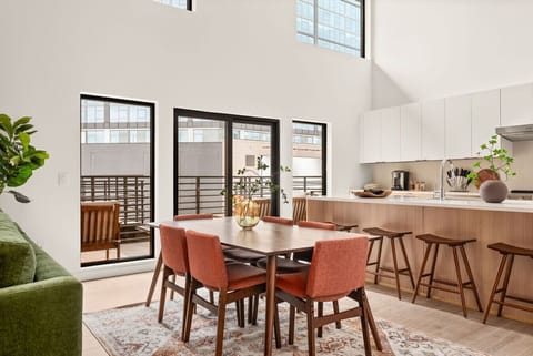 Dining tables & chair with open kitchen and large island