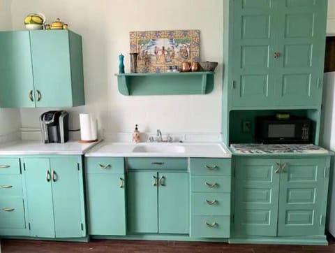 A nice pop of color, Juniper Green, in the Kitchen.