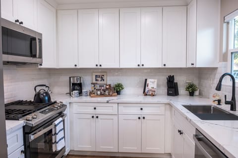 Bright, fully remodeled kitchen with gas range, stainless appliances