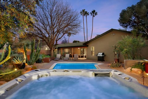 Twilight in the desert, poolside by day and hot tub ready by night. This private backyard is built for easy Scottsdale evenings after a day of golf, hiking, spring training, or exploring Old Town.