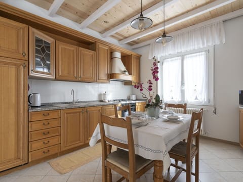 Furniture, Property, Cabinetry, Countertop, Wood, Table, Lighting, Chair, Interior Design, Kitchen