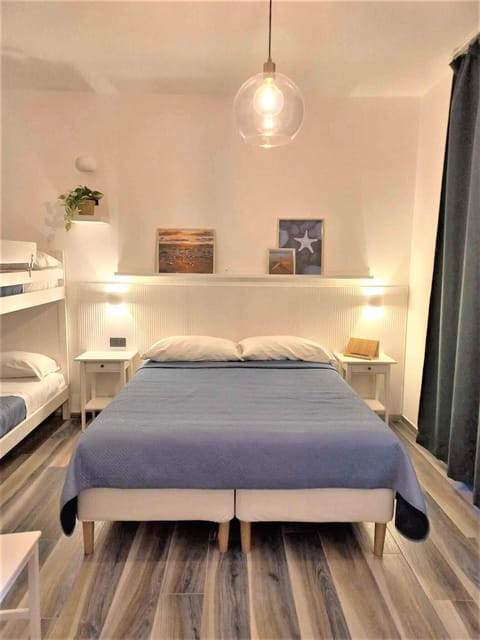 Family Quadruple Room | Premium bedding, pillowtop beds, laptop workspace, soundproofing