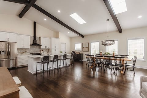 Tons of seating between the dining table and the bar