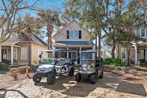 Front of Home with Two Golf Carts